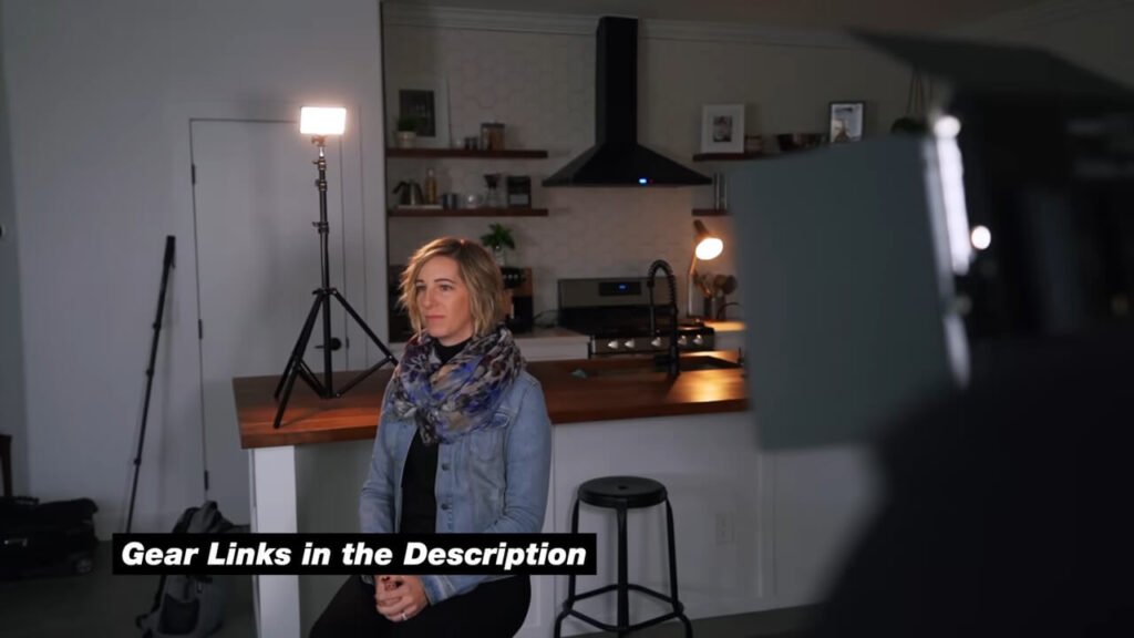 Behind-the-scenes studio setup showing the physical placement of the backlight and key light stands for a YouTube video.