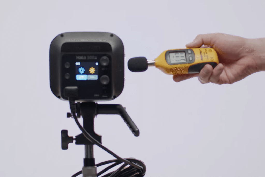 Testing the acoustic footprint: Using a professional decibel meter to record the Amaran 300x fan noise levels under load.